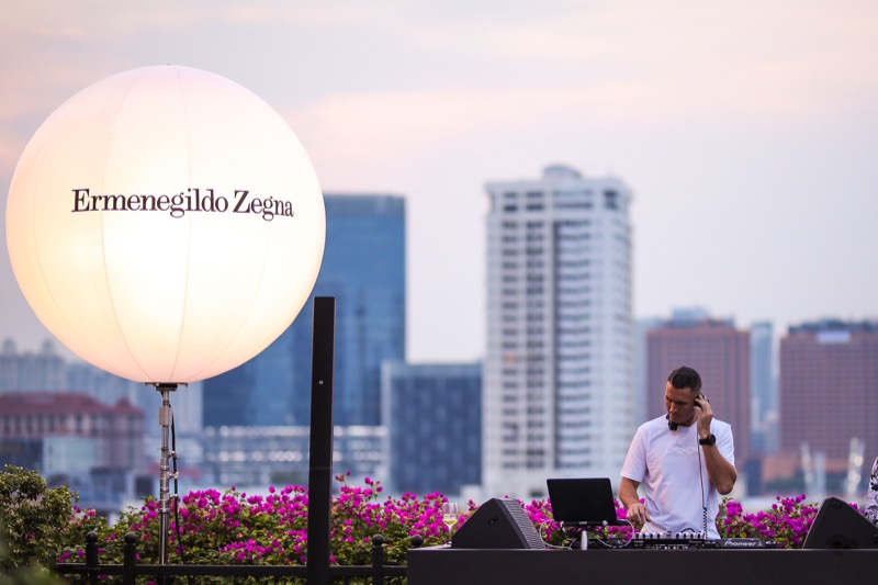 Patrick Oliver DJing at Ermenegildo Zegna rooftop event